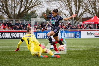 2023-03-04 - Kinga Szemik of Stade de Reims and Delphine Cascarino of Olympique Lyonnais during the Women's French Cup, Quarter-Finals football match between Stade de Reims and Olympique Lyonnais (Lyon) on March 4, 2023 at Blériot stadium in Bétheny near Reims, France - FOOTBALL - WOMEN'S FRENCH CUP - REIMS V LYON - FRENCH WOMEN DIVISION 1 - SOCCER