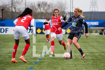 2023-03-04 - Rachel Corboz of Stade de Reims and Lindsey Horan of Olympique Lyonnais fight for the ball during the Women's French Cup, Quarter-Finals football match between Stade de Reims and Olympique Lyonnais (Lyon) on March 4, 2023 at Blériot stadium in Bétheny near Reims, France - FOOTBALL - WOMEN'S FRENCH CUP - REIMS V LYON - FRENCH WOMEN DIVISION 1 - SOCCER