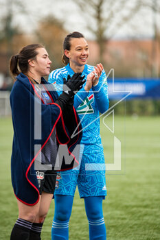 2023-03-04 - Vanessa Gilles of Olympique Lyonnais and Christiane Endler of Olympique Lyonnais celebrate the victory after the Women's French Cup, Quarter-Finals football match between Stade de Reims and Olympique Lyonnais (Lyon) on March 4, 2023 at Blériot stadium in Bétheny near Reims, France - FOOTBALL - WOMEN'S FRENCH CUP - REIMS V LYON - FRENCH WOMEN DIVISION 1 - SOCCER
