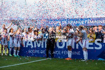 2023-05-13 - Jean Michel Aulas and the players of Olympique Lyonnais celebrate the victory after the Women's French Cup, Final football match between Olympique Lyonnais and Paris Saint-Germain on May 13, 2023 at Stade de la Source in Orleans, France - FOOTBALL - WOMEN'S FRENCH CUP - FINAL - LYON V PARIS SG - FRENCH WOMEN DIVISION 1 - SOCCER