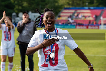 2023-05-13 - Melvine Malard of Olympique Lyonnais celebrates the victory with teammates after the Women's French Cup, Final football match between Olympique Lyonnais and Paris Saint-Germain on May 13, 2023 at Stade de la Source in Orleans, France - FOOTBALL - WOMEN'S FRENCH CUP - FINAL - LYON V PARIS SG - FRENCH WOMEN DIVISION 1 - SOCCER