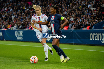 2023-05-21 - Ada Hegerberg of Olympique Lyonnais and Grace Geyoro of Paris Saint Germain fight for the ball during the Women's French championship D1 Arkema football match between Paris Saint-Germain and Olympique Lyonnais (Lyon) on May 21, 2023 at Parc des Princes stadium in Paris, France - FOOTBALL - WOMEN'S FRENCH CHAMP - PARIS SG V LYON - FRENCH WOMEN DIVISION 1 - SOCCER