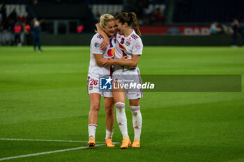 2023-05-21 - Lindsey Horan of Olympique Lyonnais and Signe Bruun of Olympique Lyonnais celebrate the victory after the Women's French championship D1 Arkema football match between Paris Saint-Germain and Olympique Lyonnais (Lyon) on May 21, 2023 at Parc des Princes stadium in Paris, France - FOOTBALL - WOMEN'S FRENCH CHAMP - PARIS SG V LYON - FRENCH WOMEN DIVISION 1 - SOCCER