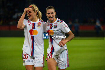 2023-05-21 - Lindsey Horan of Olympique Lyonnais and Signe Bruun of Olympique Lyonnais celebrate the victory after the Women's French championship D1 Arkema football match between Paris Saint-Germain and Olympique Lyonnais (Lyon) on May 21, 2023 at Parc des Princes stadium in Paris, France - FOOTBALL - WOMEN'S FRENCH CHAMP - PARIS SG V LYON - FRENCH WOMEN DIVISION 1 - SOCCER