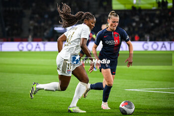 2023-10-01 - Kadidiatou DIANI of Lyon and Jade LE GUILLY of PSG during the women’s French championship D1 Arkema football match between Paris Saint Germain and Olympique Lyonnais on October 1, 2023 at Parc des Princes stadium in Paris, France - FOOTBALL - WOMEN'S FRENCH CHAMP - PARIS SG V LYON - FRENCH WOMEN DIVISION 1 - SOCCER