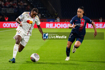 2023-09-15 - Vicki Becho of Olympique Lyonnais and Sakina Karchaoui of Paris Saint Germain fight for the ball during the women’s French championship D1 Arkema football match between Paris Saint Germain and Olympique Lyonnais on October 1, 2023 at Parc des Princes stadium in Paris, France - FOOTBALL - WOMEN FRENCH CHAMP - PARIS SG V LYON - FRENCH WOMEN DIVISION 1 - SOCCER