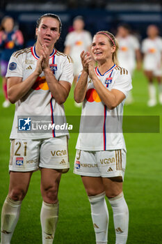 2023-09-15 - Vanessa Gilles of Olympique Lyonnais and Eugenie Le Sommer of Olympique Lyonnais celebrate the victory after the women’s French championship D1 Arkema football match between Paris Saint Germain and Olympique Lyonnais on October 1, 2023 at Parc des Princes stadium in Paris, France - FOOTBALL - WOMEN FRENCH CHAMP - PARIS SG V LYON - FRENCH WOMEN DIVISION 1 - SOCCER