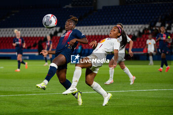 2023-09-15 - Sandy Baltimore of Paris Saint Germain and Perle Morroni of Olympique Lyonnais fight for the ball during the women’s French championship D1 Arkema football match between Paris Saint Germain and Olympique Lyonnais on October 1, 2023 at Parc des Princes stadium in Paris, France - FOOTBALL - WOMEN FRENCH CHAMP - PARIS SG V LYON - FRENCH WOMEN DIVISION 1 - SOCCER