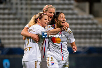 2023-11-05 - Eugenie Le Sommer of Olympique Lyonnais celebrates after scoring with Lindsey Horan of Olympique Lyonnais and Selma Bacha of Olympique Lyonnais during the Women's French championship, D1 Arkema football match between Paris FC and Olympique Lyonnais (Lyon) on November 5, 2023 at Sébastien Charléty stadium in Paris, France - FOOTBALL - WOMEN'S FRENCH CHAMP - PARIS FC V LYON - FRENCH WOMEN DIVISION 1 - SOCCER