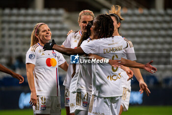 2023-11-05 - Eugenie Le Sommer of Olympique Lyonnais celebrates after scoring with Melchie Dumornay of Olympique Lyonnais and teammates during the Women's French championship, D1 Arkema football match between Paris FC and Olympique Lyonnais (Lyon) on November 5, 2023 at Sébastien Charléty stadium in Paris, France - FOOTBALL - WOMEN'S FRENCH CHAMP - PARIS FC V LYON - FRENCH WOMEN DIVISION 1 - SOCCER