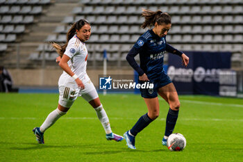 2023-11-05 - Selma Bacha of Olympique Lyonnais Clara Mateo of Paris FC fight for the ball during the Women's French championship, D1 Arkema football match between Paris FC and Olympique Lyonnais (Lyon) on November 5, 2023 at Sébastien Charléty stadium in Paris, France - FOOTBALL - WOMEN'S FRENCH CHAMP - PARIS FC V LYON - FRENCH WOMEN DIVISION 1 - SOCCER
