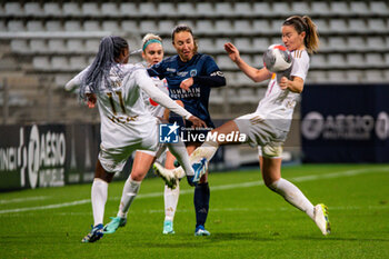 2023-11-05 - Kadidiatou Diani of Olympique Lyonnais, Gaetane Thiney of Paris FC and Damaris Egurrola of Olympique Lyonnais fight for the ball during the Women's French championship, D1 Arkema football match between Paris FC and Olympique Lyonnais (Lyon) on November 5, 2023 at Sébastien Charléty stadium in Paris, France - FOOTBALL - WOMEN'S FRENCH CHAMP - PARIS FC V LYON - FRENCH WOMEN DIVISION 1 - SOCCER