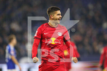 24/01/2023 - Andre Silva of Leipzig celebrates during the German championship Bundesliga football match between FC Schalke 04 and RB Red Bull Leipzig on January 24, 2023 at Veltins-Arena in Gelsenkirchen, Germany - FOOTBALL - GERMAN CHAMP - SCHALKE 04 V LEIPZIG - GERMAN BUNDESLIGA - CALCIO