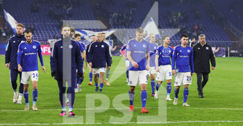 24/01/2023 - Schalke players dejected at full time during the German championship Bundesliga football match between FC Schalke 04 and RB Red Bull Leipzig on January 24, 2023 at Veltins-Arena in Gelsenkirchen, Germany - FOOTBALL - GERMAN CHAMP - SCHALKE 04 V LEIPZIG - GERMAN BUNDESLIGA - CALCIO
