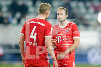 2023-02-05 - Matthijs de Ligt and Daley Blind of Bayern Munich during the German championship Bundesliga football match between VfL Wolfsburg and Bayern Munich on February 5, 2023 at Volkswagen Arena in Wolfsburg, Germany - FOOTBALL - GERMAN CHAMP - WOLFSBURG V BAYERN MUNICH - GERMAN BUNDESLIGA - SOCCER