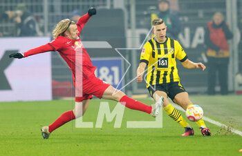 2023-03-03 - Nico Schlotterbeck of Dortmund and Emil Forsberg of Leipzig during the German championship Bundesliga football match between Borussia Dortmund and RB Leipzig on March 3, 2023 at Signal Iduna Park in Dortmund, Germany - FOOTBALL - GERMAN CHAMP - DORTMUND V LEIPZIG - GERMAN BUNDESLIGA - SOCCER