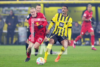 2023-03-03 - Xaver Schlager of Leipzig and Sebastien Haller of Dortmund during the German championship Bundesliga football match between Borussia Dortmund and RB Leipzig on March 3, 2023 at Signal Iduna Park in Dortmund, Germany - FOOTBALL - GERMAN CHAMP - DORTMUND V LEIPZIG - GERMAN BUNDESLIGA - SOCCER