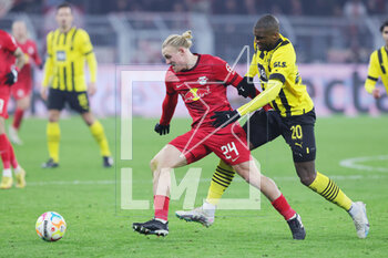 2023-03-03 - Xaver Schlager of Leipzig and Anthony Modeste of Dortmund during the German championship Bundesliga football match between Borussia Dortmund and RB Leipzig on March 3, 2023 at Signal Iduna Park in Dortmund, Germany - FOOTBALL - GERMAN CHAMP - DORTMUND V LEIPZIG - GERMAN BUNDESLIGA - SOCCER