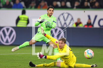 2023-03-12 - Omar Marmoush of Wolfsburg and Frederik Ronnow of Union Berlin during the German championship Bundesliga football match between VfL Wolfsburg and FC Union Berlin on March 12, 2023 at Volkswagen Arena in Wolfsburg, Germany - FOOTBALL - GERMAN CHAMP - WOLFSBURG V UNION BERLIN - GERMAN BUNDESLIGA - SOCCER