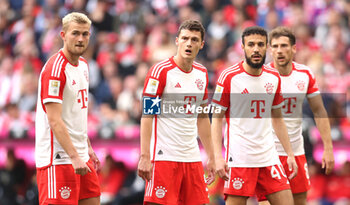 2023-05-20 - Mattijs de Ligt, Benjamin Pavard, Noussair Mazraoui of Bayern Munich during the German championship Bundesliga football match between Bayern Munich and RB Leipzig on May 20, 2023 at Allianz Arena in Munich, Germany - FOOTBALL - GERMAN CHAMP - BAYERN MUNICH V RB LEIPZIG - GERMAN BUNDESLIGA - SOCCER