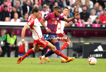 2023-05-20 - Leon Goretzka of Bayern Munich and Christopher Nkunku of RB Leipzig during the German championship Bundesliga football match between Bayern Munich and RB Leipzig on May 20, 2023 at Allianz Arena in Munich, Germany - FOOTBALL - GERMAN CHAMP - BAYERN MUNICH V RB LEIPZIG - GERMAN BUNDESLIGA - SOCCER