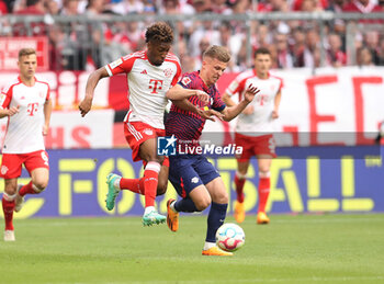 2023-05-20 - Kingsley Coman of Bayern Munich and Dani Olmo of RB Leipzig during the German championship Bundesliga football match between Bayern Munich and RB Leipzig on May 20, 2023 at Allianz Arena in Munich, Germany - FOOTBALL - GERMAN CHAMP - BAYERN MUNICH V RB LEIPZIG - GERMAN BUNDESLIGA - SOCCER