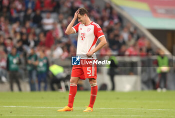 2023-05-20 - Benjamin Pavard of Bayern Munich looks dejected at full time during the German championship Bundesliga football match between Bayern Munich and RB Leipzig on May 20, 2023 at Allianz Arena in Munich, Germany - FOOTBALL - GERMAN CHAMP - BAYERN MUNICH V RB LEIPZIG - GERMAN BUNDESLIGA - SOCCER