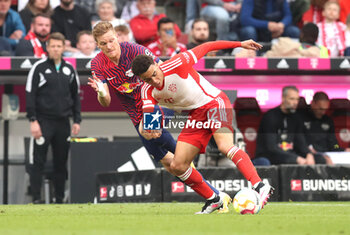 2023-05-20 - Jamal Musiala of Bayern Munich and Marcel Halstenberg of RB Leipzig during the German championship Bundesliga football match between Bayern Munich and RB Leipzig on May 20, 2023 at Allianz Arena in Munich, Germany - FOOTBALL - GERMAN CHAMP - BAYERN MUNICH V RB LEIPZIG - GERMAN BUNDESLIGA - SOCCER