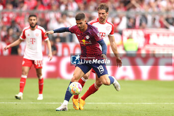 2023-05-20 - Andre Silva of RB Leipzig and Leon Goretzka of Bayern Munich during the German championship Bundesliga football match between Bayern Munich and RB Leipzig on May 20, 2023 at Allianz Arena in Munich, Germany - FOOTBALL - GERMAN CHAMP - BAYERN MUNICH V RB LEIPZIG - GERMAN BUNDESLIGA - SOCCER