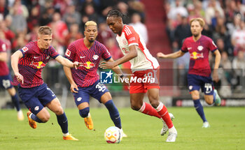 2023-05-20 - Mathys Tel of Bayern Munich and Dani Olmo of RB Leipzig during the German championship Bundesliga football match between Bayern Munich and RB Leipzig on May 20, 2023 at Allianz Arena in Munich, Germany - FOOTBALL - GERMAN CHAMP - BAYERN MUNICH V RB LEIPZIG - GERMAN BUNDESLIGA - SOCCER