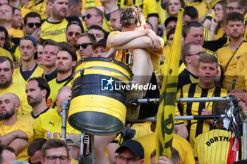 2023-05-27 - Borussia Dortmund Fans look dejected after the German championship Bundesliga football match between Borussia Dortmund and FSV Mainz on May 27, 2023 at Signal Iduna Park in Dortmund, Germany - FOOTBALL - GERMAN CHAMP - DORTMUND V MAINZ - GERMAN BUNDESLIGA - SOCCER