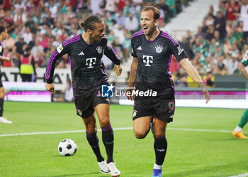 2023-08-18 - Harry Kane of Bayern Munich celebrates his goal 0-2 with Leroy Sane during the German championship Bundesliga football match between Werder Bremen and Bayern Munich on August 18, 2023 at Weserstadion in Bremen, Germany - FOOTBALL - GERMAN CHAMP - WERDER BREMEN V BAYERN MUNICH - GERMAN BUNDESLIGA - SOCCER