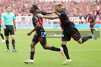 2023-08-19 - Jeremie Frimpong of Bayer Leverkusen celebrates his goal 1-0 with Exequiel Palacios during the German championship Bundesliga football match between Bayer Leverkusen and Red Bull Leipzig on August 10, 2023 at BayArena in Leverkusen, Germany - FOOTBALL - GERMAN CHAMP - LEVERKUSEN V LEIPZIG - GERMAN BUNDESLIGA - SOCCER