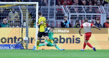 2023-11-04 - Harry Kane of Bayern Munich scores a goal 0-3 during the German championship Bundesliga football match between Borussia Dortmund and Bayern Munich on November 4, 2023 at Signal Iduna Park in Dortmund, Germany - FOOTBALL - GERMAN CHAMP - BORUSSIA DORTMUND V BAYERN MUNICH - GERMAN BUNDESLIGA - SOCCER