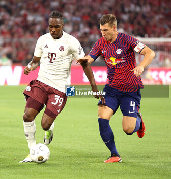 2023-08-12 - Mathys Tel of Bayern Munich and Willi Orban of RB Leipzig during the DFL Supercup 2023, German SuperCup football match between Bayern Munich and RB Leipzig on August 12, 2023 at Allianz Arena in Munich, Germany - FOOTBALL - GERMAN SUPERCUP - BAYERN MUNICH V RB LEIPZIG - GERMAN SUPERCUP - SOCCER