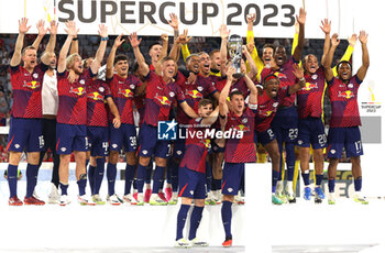 2023-08-12 - Timo Werner, Willi Orban of RB Leipzig celebrate with teammates after winning the DFL Supercup 2023, German SuperCup football match between Bayern Munich and RB Leipzig on August 12, 2023 at Allianz Arena in Munich, Germany - FOOTBALL - GERMAN SUPERCUP - BAYERN MUNICH V RB LEIPZIG - GERMAN SUPERCUP - SOCCER