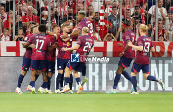 2023-08-12 - Dani Olmo of RB Leipzig celebrates his goal 0-1 with teammates during the DFL Supercup 2023, German SuperCup football match between Bayern Munich and RB Leipzig on August 12, 2023 at Allianz Arena in Munich, Germany - FOOTBALL - GERMAN SUPERCUP - BAYERN MUNICH V RB LEIPZIG - GERMAN SUPERCUP - SOCCER