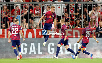 2023-08-12 - Dani Olmo of RB Leipzig celebrates his goal 0-1 with teammates during the DFL Supercup 2023, German SuperCup football match between Bayern Munich and RB Leipzig on August 12, 2023 at Allianz Arena in Munich, Germany - FOOTBALL - GERMAN SUPERCUP - BAYERN MUNICH V RB LEIPZIG - GERMAN SUPERCUP - SOCCER