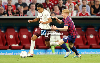 2023-08-12 - Jamal Musiala of Bayern Munich and Nicolas Seiwald of RB Leipzig during the DFL Supercup 2023, German SuperCup football match between Bayern Munich and RB Leipzig on August 12, 2023 at Allianz Arena in Munich, Germany - FOOTBALL - GERMAN SUPERCUP - BAYERN MUNICH V RB LEIPZIG - GERMAN SUPERCUP - SOCCER