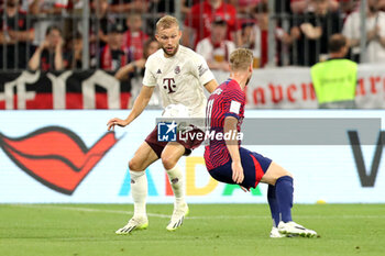 2023-08-12 - Konrad Laimer of Bayern Munich and Timo Werner of RB Leipzig during the DFL Supercup 2023, German SuperCup football match between Bayern Munich and RB Leipzig on August 12, 2023 at Allianz Arena in Munich, Germany - FOOTBALL - GERMAN SUPERCUP - BAYERN MUNICH V RB LEIPZIG - GERMAN SUPERCUP - SOCCER
