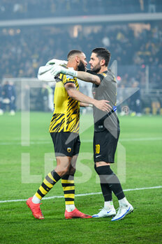2023-01-08 - 2 HAROLD MOUKOUDI with 30 GEORGIOS ATHANASIADIS of Aek FC celebrating the victory during the Greek Super League, Matchday 17, match between Aek FC and Panathinaikos FC at Opap Arena Stadium on January 8, 2023 in Athens, Greece. - AEK FC VS PANATHINAIKOS FC - GREEK SUPER LEAGUE - SOCCER