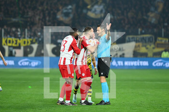 2023-03-12 - 7 KOSTAS FORTOUNIS of Olympiacos FC disagree with referee decision during the Greek Super League, Matchday 26, match between AEK FC and Olympiacos FC at OPAP Arena on March 12, 2023, in Athens, Greece. - AEK FC VS OLYMPIACOS FC - GREEK SUPER LEAGUE - SOCCER