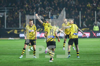 2023-03-12 - 10 STEVEN ZUBER of AEK FC celebrating with his teammates a goal during the Greek Super League, Matchday 26, match between AEK FC and Olympiacos FC at OPAP Arena on March 12, 2023, in Athens, Greece. - AEK FC VS OLYMPIACOS FC - GREEK SUPER LEAGUE - SOCCER