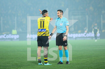 2023-03-12 - 11 SERGIO ARAUJO of AEK FC disagree with referee decision during the Greek Super League, Matchday 26, match between AEK FC and Olympiacos FC at OPAP Arena on March 12, 2023, in Athens, Greece. - AEK FC VS OLYMPIACOS FC - GREEK SUPER LEAGUE - SOCCER