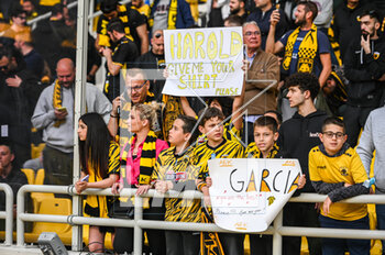 2023-05-03 - AEK FC supporters are having fun during the Greek Super League, Playoff match between AEK FC and Olympiacos FC at OPAP Arena on May 3, 2023, in Athens, Greece. - AEK VS OLYMPIACOS - GREEK SUPER LEAGUE - SOCCER