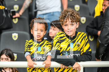 2023-05-03 - AEK FC supporters are having fun during the Greek Super League, Playoff match between AEK FC and Olympiacos FC at OPAP Arena on May 3, 2023, in Athens, Greece. - AEK VS OLYMPIACOS - GREEK SUPER LEAGUE - SOCCER