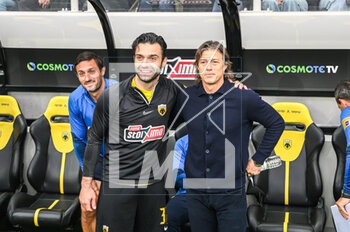 2023-05-03 - Coach MATIAS ALMEYDA with GIORGOS TZAVELLAS of AEK FC before the Greek Super League, playoff match between AEK FC and Olympiacos FC at OPAP Arena on May 3, 2023, in Athens, Greece. - AEK VS OLYMPIACOS - GREEK SUPER LEAGUE - SOCCER