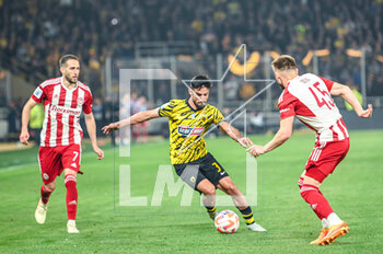 2023-05-03 - 3 MILAD MOHAMMADI of AEK FC competing with 45 OLEG REABCIUK of Olympiacos FC during the Greek Super League, playoff match between AEK FC and Olympiacos FC at OPAP Arena on May 3, 2023, in Athens, Greece. - AEK VS OLYMPIACOS - GREEK SUPER LEAGUE - SOCCER