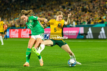 2023-07-20 - Cortnee Vine (5) of Australia and Heather Payne (14) of Republic of Ireland during the 2023 FIFA Women’s World Cup, Group B football match between Australia and Republic of Ireland on 20 July 2023 at Stadium Australia in Sydney, Australia - FOOTBALL - WOMEN'S WORLD CUP 2023 - AUSTRALIA V REPUBLIC OF IRELAND - FIFA WORLD CUP - SOCCER