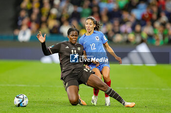 2023-07-24 - Clara Mateo (12) of France tussles with Khadija Shaw (11) of Jamaica during the 2023 FIFA Women’s World Cup, Group F football match between France and Jamaica on 23 July 2023 at Stadium Australia in Sydney, Australia - FOOTBALL - WOMEN'S WORLD CUP 2023 - FRANCE V JAMAICA - FIFA WORLD CUP - SOCCER